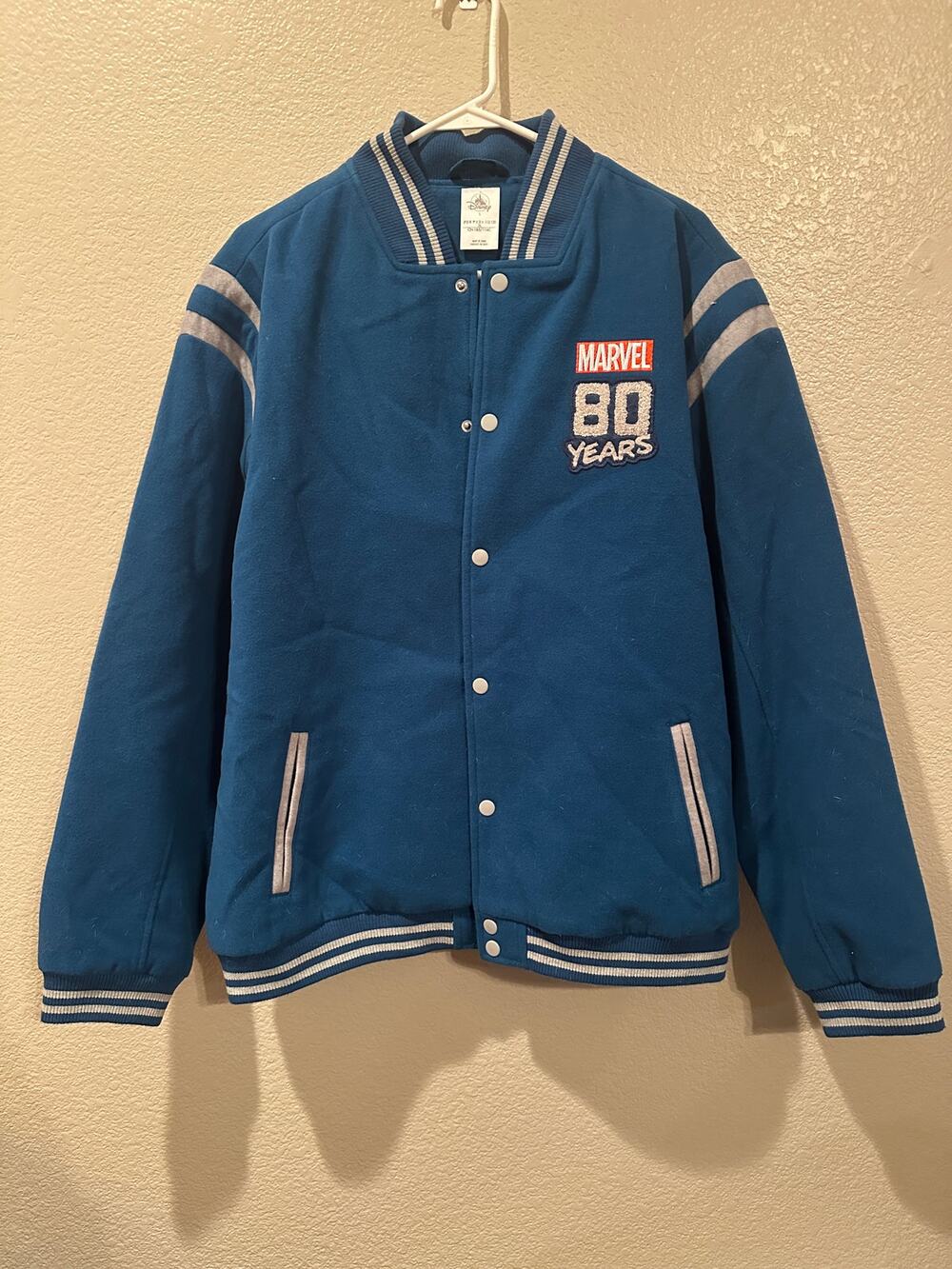 NWOT Disney Parks Marvel 80th Year Anniversary Blue Letterman Bomber Jacket L
